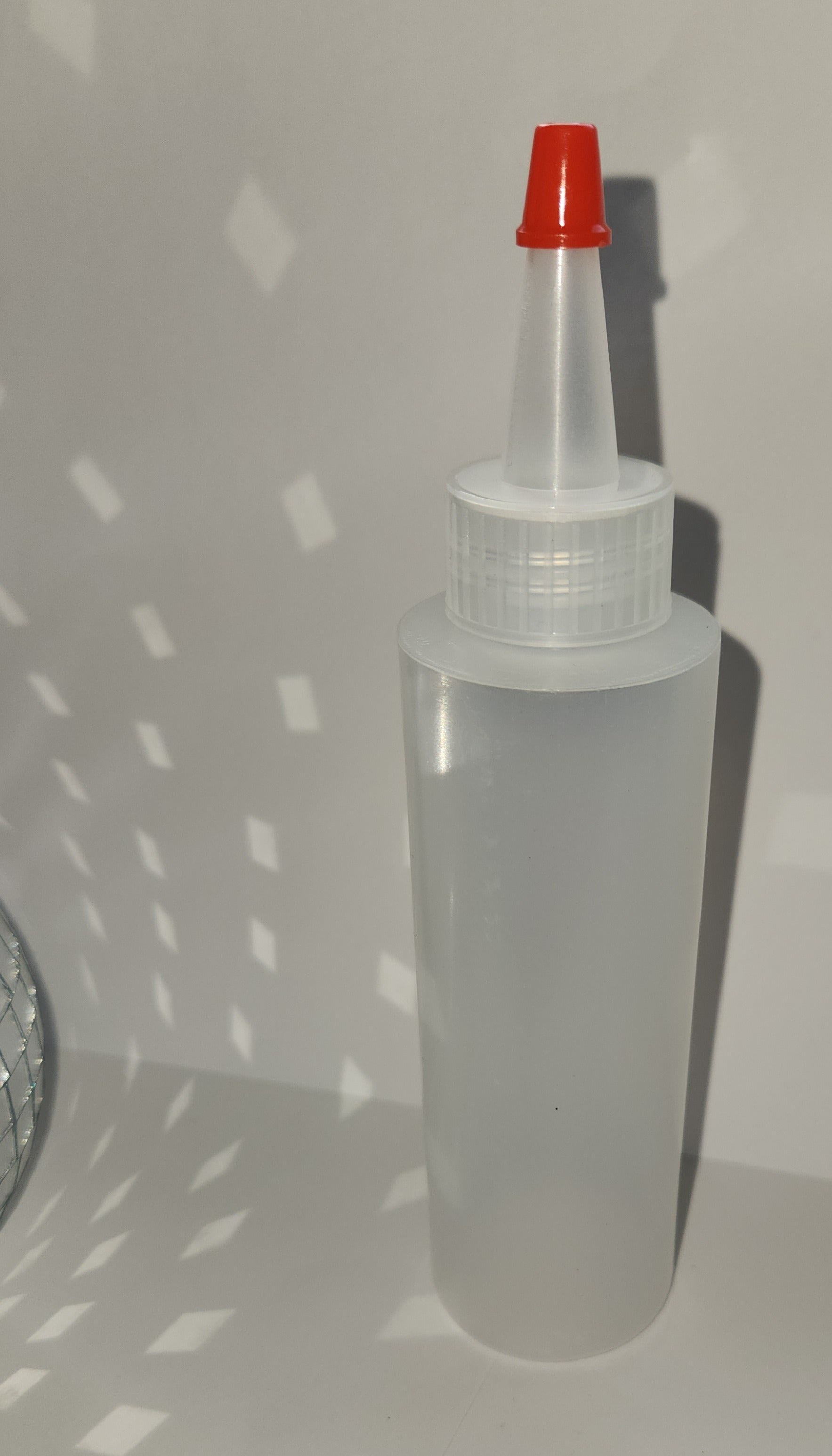 Tipped squeeze bottle